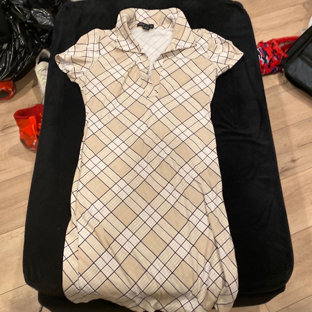 A tan pattern dress